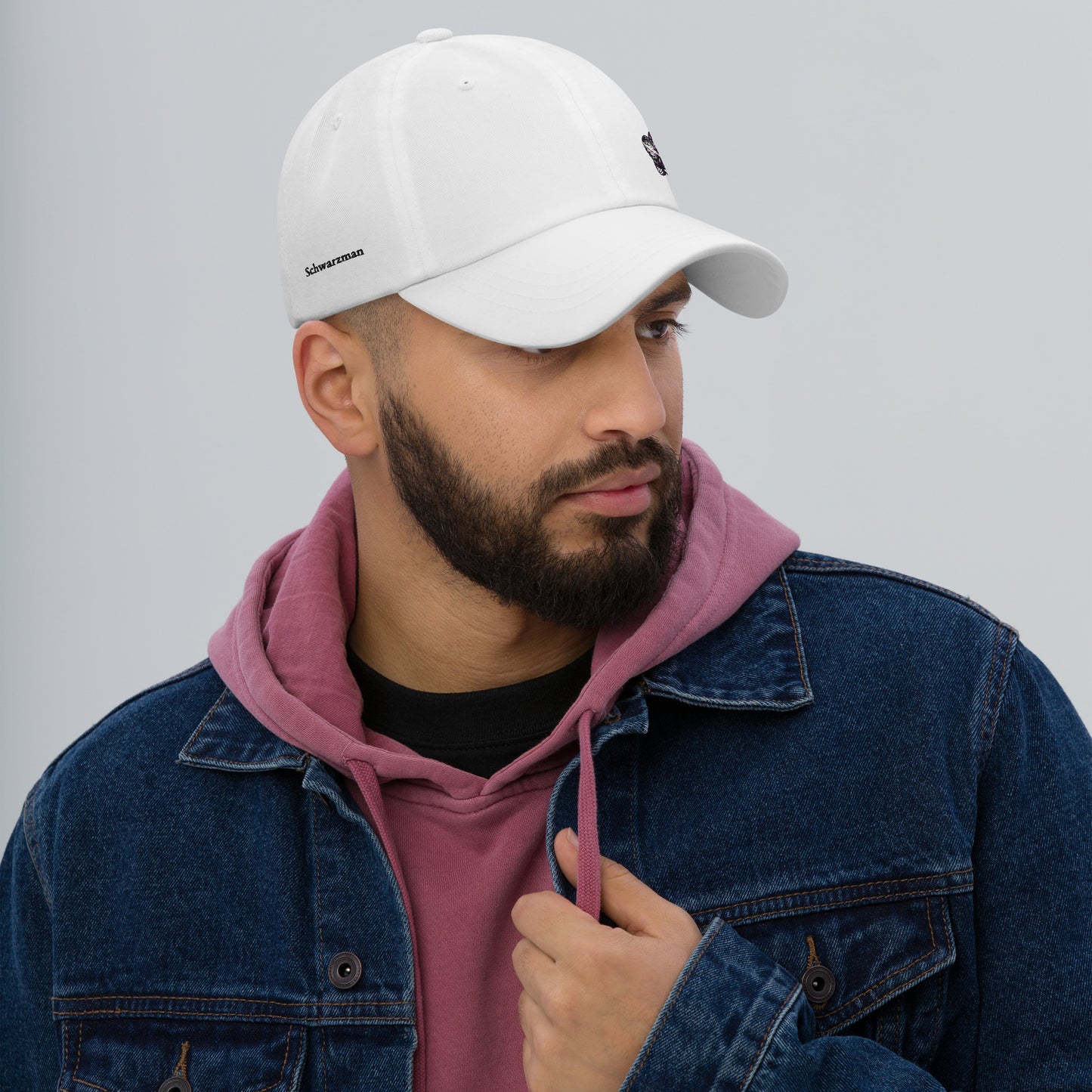 White Signature classic dad hat with orchid emblem – Schwarzman