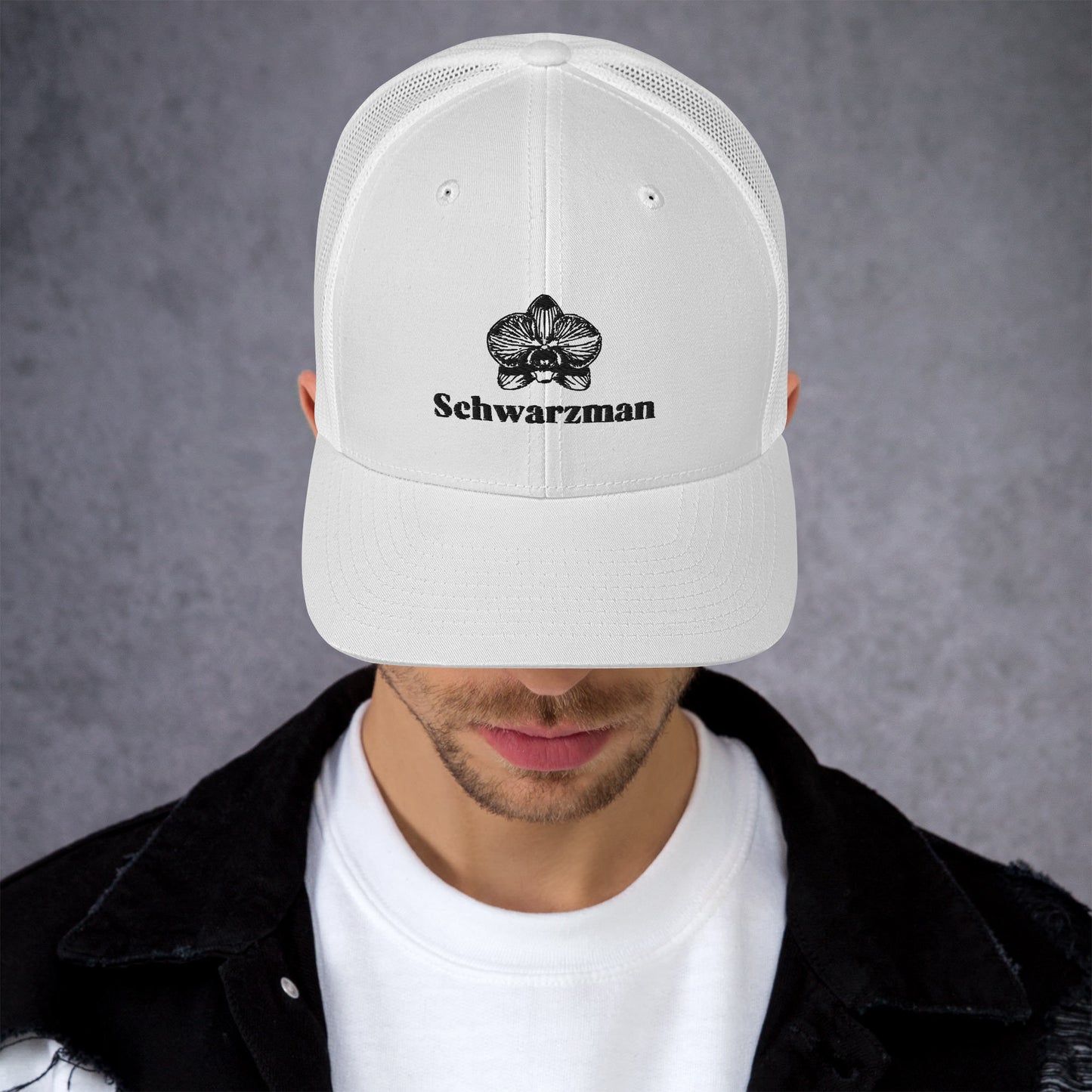 White retro trucker hat with orchid emblem – Schwarzman