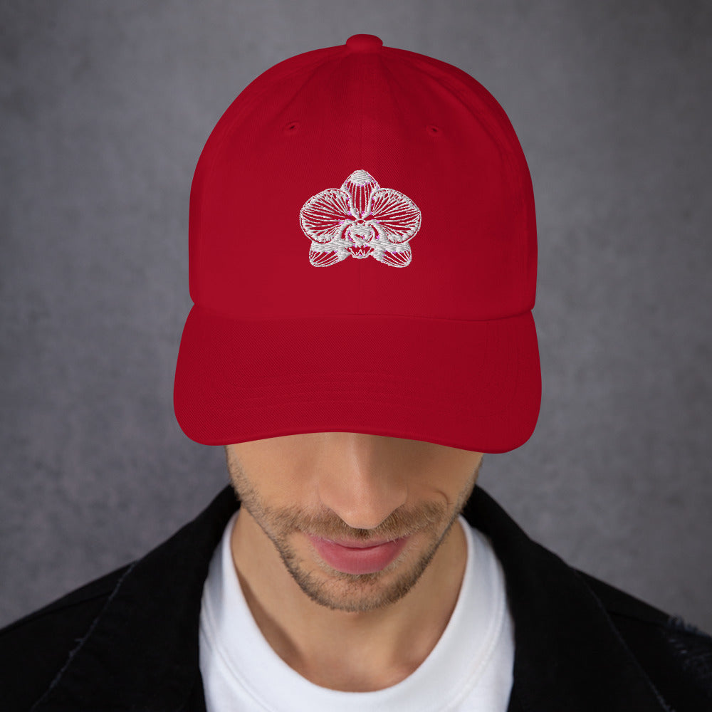 Red cranberry classic dad hat with orchid emblem – Schwarzman